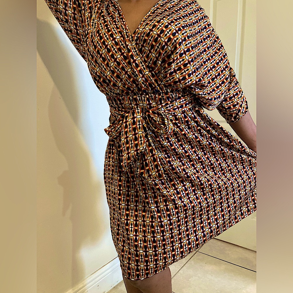 Beautiful knee length satin fabric dress.
